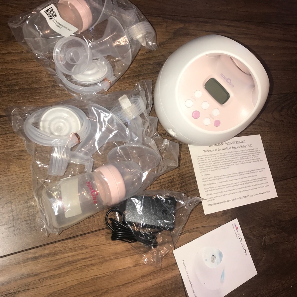 BRAND NEW BREASTPUMP W/bottles, accessories & more
